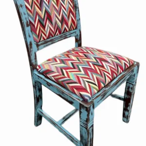 Silla madera en azul envejecido y tapizada en colores vivos con motivos étnicos